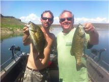 Dad and I with a smallie double